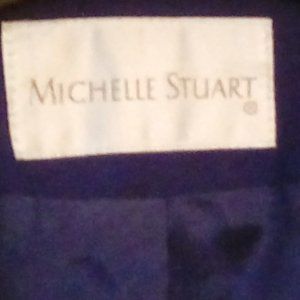 Michelle Stuart, collarless dark blue jacket, LS